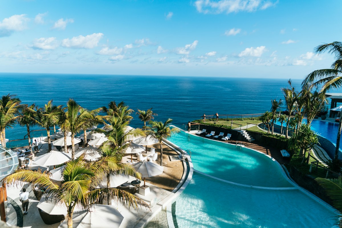 Infinity pool overlooking the ocean at sunset